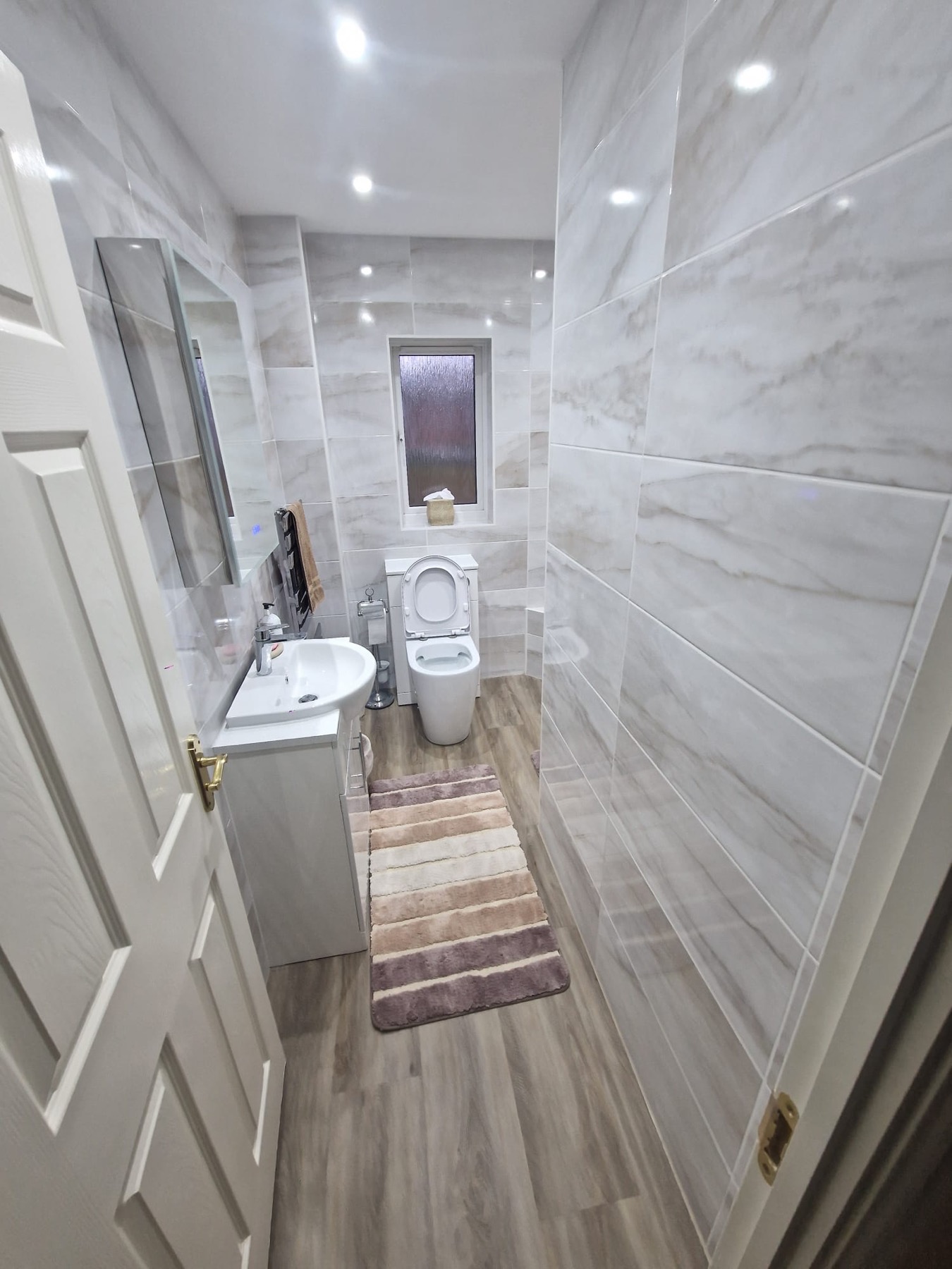 Marble Effect Tiled Bathroom