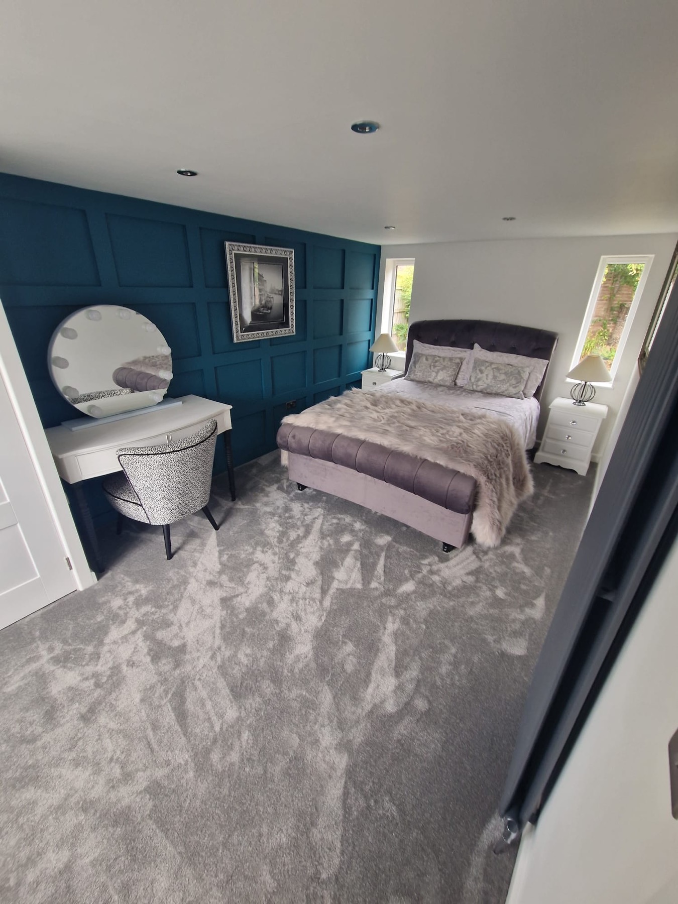 Bedroom with Teal Feature Wall and Panelling